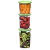 Three clear vacuum seal containers with green lids stacked vertically, filled with fresh carrot sticks, whole strawberries, and mixed leafy greens, ideal for food preservation in Kitchen & Food collections.