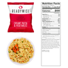 ReadyWise creamy pasta and vegetables meal pouch with prepared creamy pasta and garden vegetables on white plate, featuring nutrition facts panel, USA made emergency food supply.