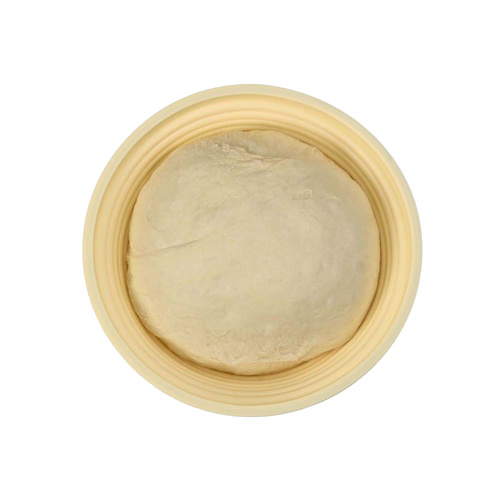 Light-colored collapsible proofing basket made from silicone with steel rim, holding round dough rising, ideal for Kitchen & Food and Baking Supplies collections.