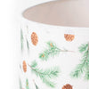 Close-up of a parchment lamp shade decorated with pine bough and pinecone illustrations, designed for a warm, rustic ambiance in Lamps & Lighting and Lamp Shades collections.