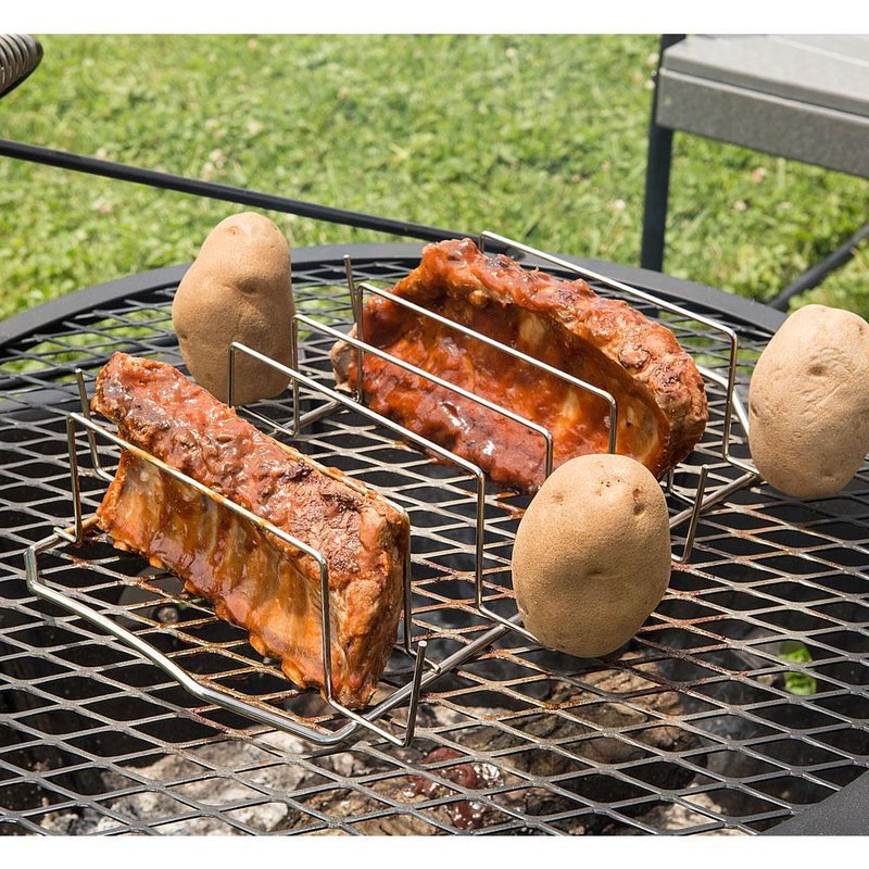 Nickel-plated rack holding ribs vertically alongside whole potatoes on skewers, designed for space-saving grilling or oven cooking, featured in Farm, Garden & Tool, Kitchen & Food, and Grilling collections.