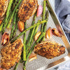 Natural aluminum baking pan with prism grid lines roasting seasoned chicken breasts, asparagus, and shallots, featured in Kitchen & Food, Cookware, Baking Supplies, Pots and Pans, USA Made, and Best Sellers collections.