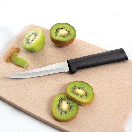 Handcrafted paring knife with a high carbon surgical stainless steel blade and solid black handle slicing fresh kiwi on a cutting board, ideal for food prep in kitchen and farm tool collections.