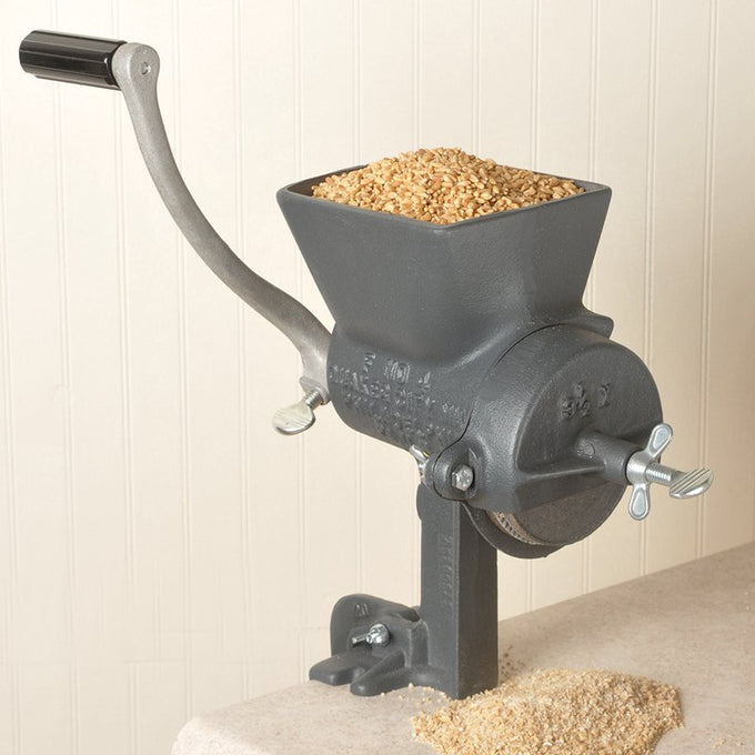 Handcrafted heavy-duty grain mill made in USA with sturdy cast iron construction, adjustable for coarse to fine grind, ideal for Kitchen & Food, Grain Mills, and Bread Making Supplies collections.
