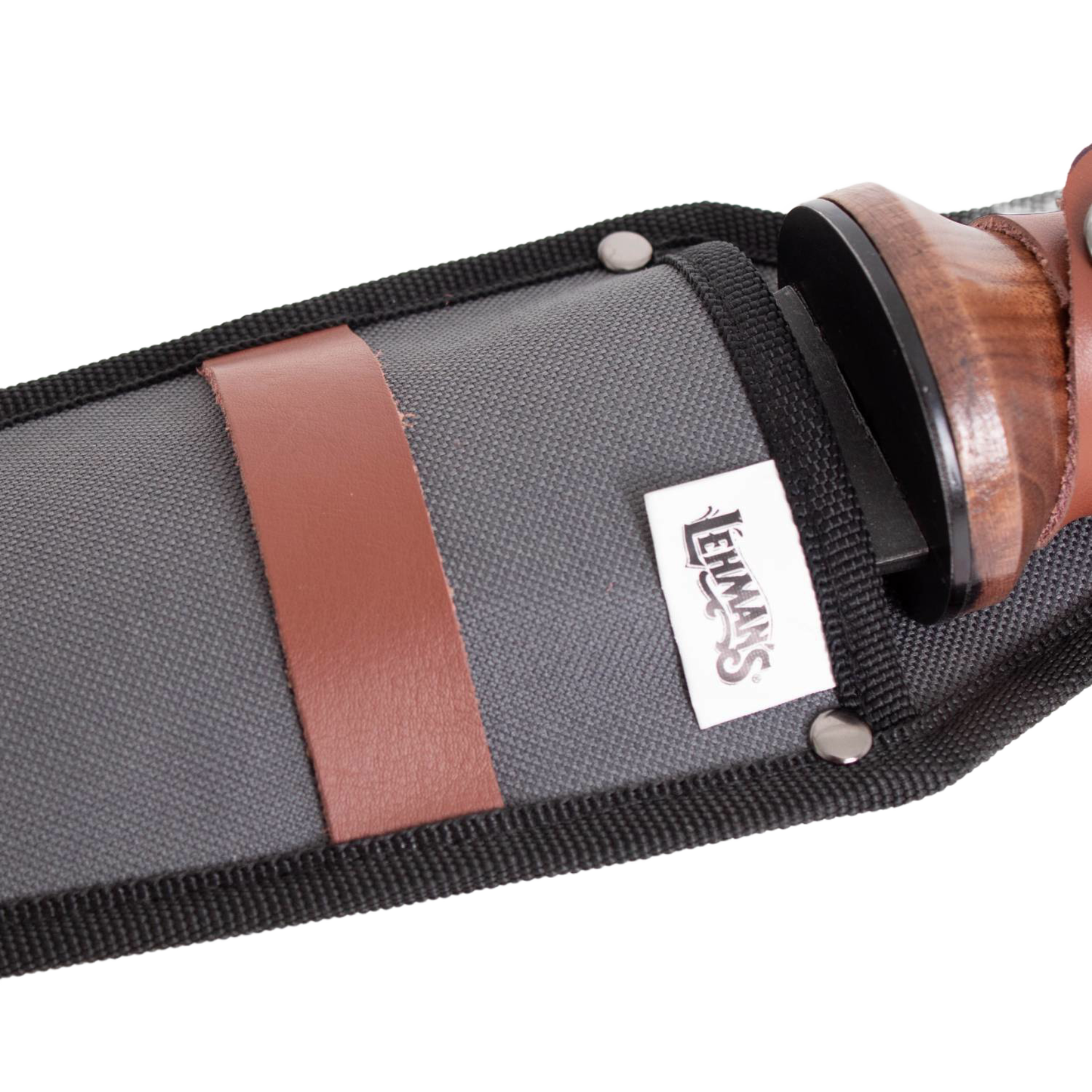 Close-up of a durable fabric sheath with leather strap and metal rivets, partially showing a wooden-handled gardening tool, highlighting handcrafted quality for Farm, Garden & Tool collections.