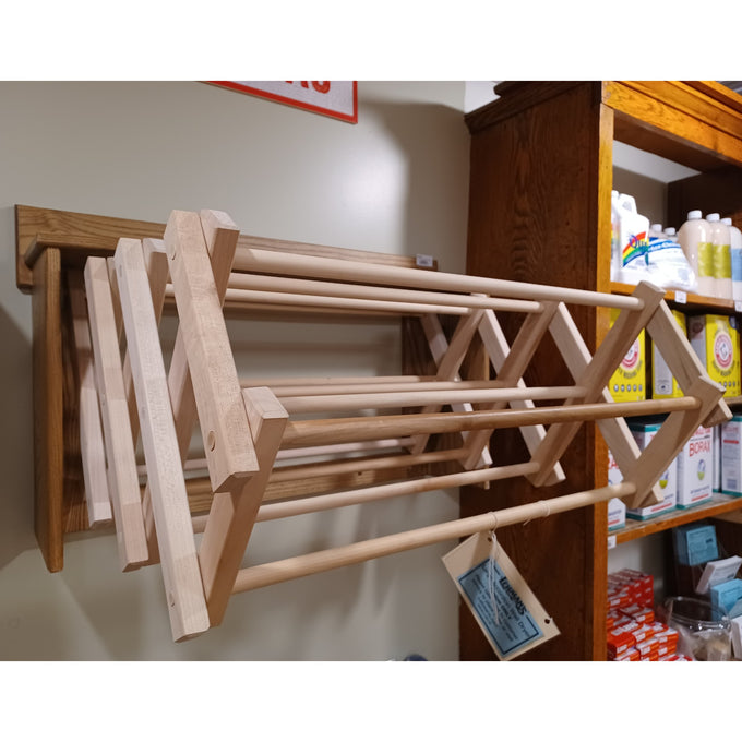 Handcrafted Amish made accordion wall clothes dryer in natural wood, featuring multiple rods and a convenient shelf, ideal for Home & Decor, Laundry Supplies, and USA Made collections.