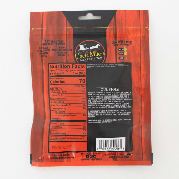 Rear view of resealable packaging for traditional beef jerky showing nutrition facts, product story, and heat level chart, highlighting a high-protein, USA made snack for Kitchen & Food and Meats collections.