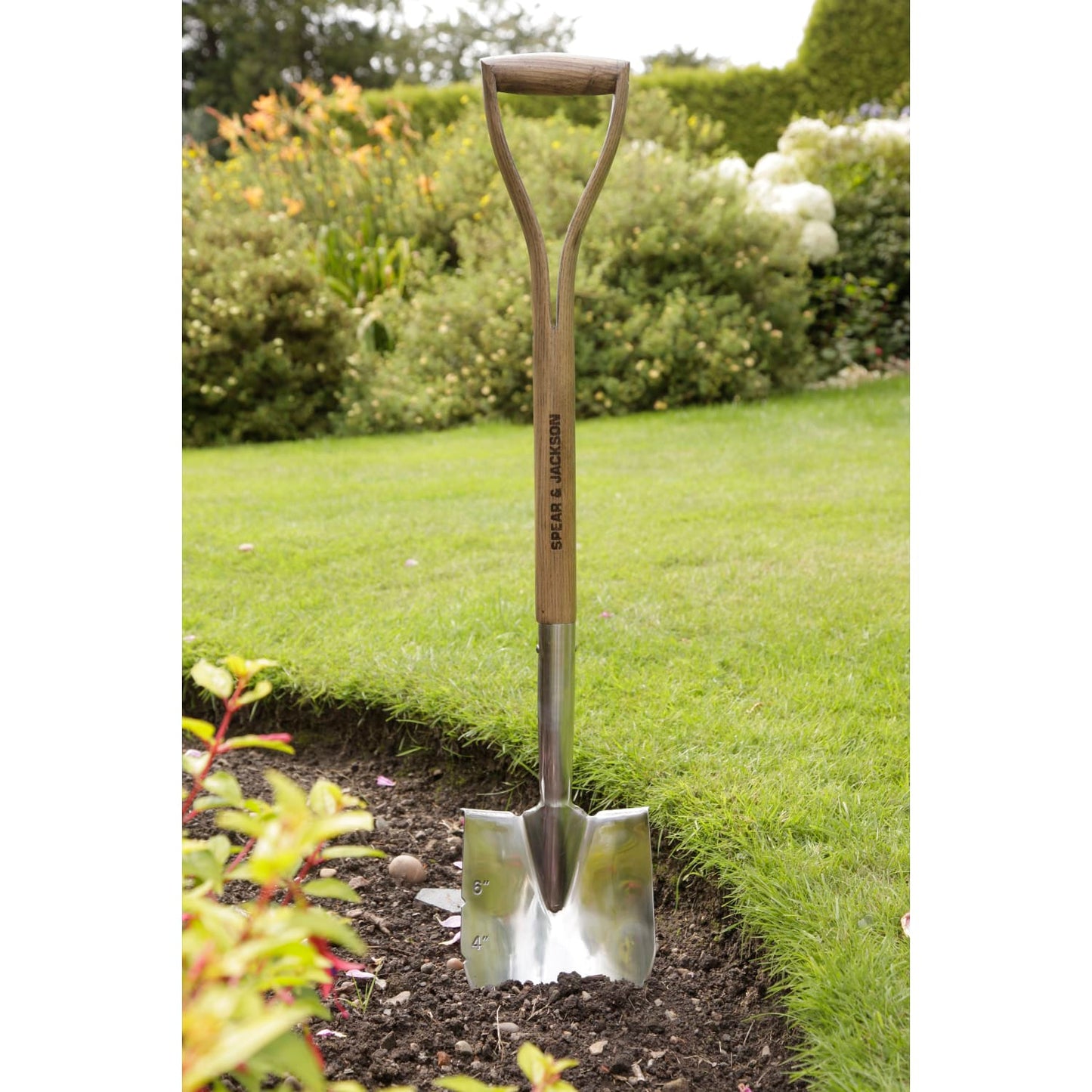 Stainless steel planting spade with a pointed blade featuring depth markings and a sturdy double-riveted wooden handle, designed for garden beds, borders, and planting tasks in Farm, Garden & Tool and Seeds and Planting collections.