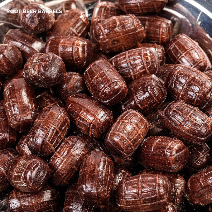 Close-up of root beer barrel-shaped hard candies with a glossy finish, evoking nostalgic flavors, featured in Kitchen & Food, Snacks and Sweets, Food, Best Sellers, and Promo Eligible collections.