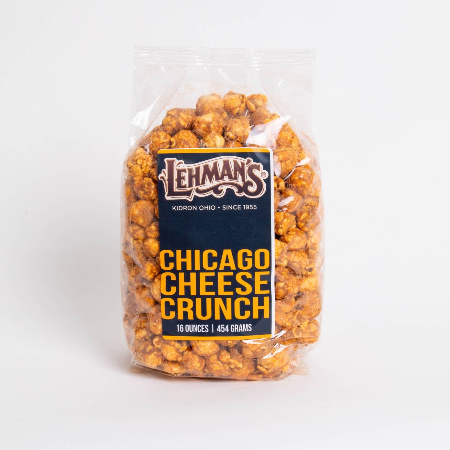 Clear bag of handcrafted caramel popcorn with Chicago cheese crunch flavor, a unique sweet and savory snack made in USA, ideal for Kitchen & Food, Snacks and Sweets, Popcorn, USA Made, Best Sellers, and Promo Eligible collections.
