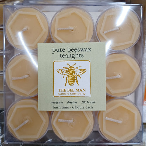Box of nine handcrafted pure beeswax tealight candles with natural honey color, smokeless and dripless for up to six hours burn time, featured in USA Made and Candles collections.