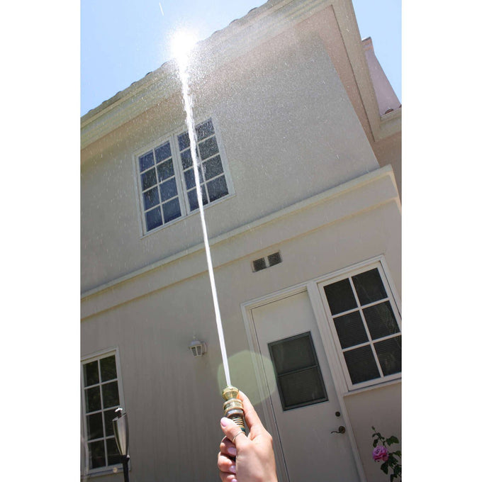 Handheld solid brass garden hose nozzle spraying a concentrated, high-force stream of water, featured in Farm, Garden & Tool, Garden Accessories, Lawncare, USA Made, and Best Sellers collections.