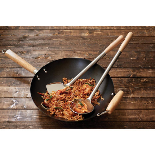 Wok filled with stir-fried noodles and shrimp, accompanied by a wooden-handled spatula and ladle set, perfect for Asian cooking in Kitchen & Food and Kitchen Gadgets collections.