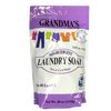 Purple and white resealable bag of Grandma's all-natural laundry soap featuring colorful clothes illustrations, labeled safe for sensitive skin and colors, suitable for use in hot or cold water, ideal for Home & Decor and Laundry Supplies collections.