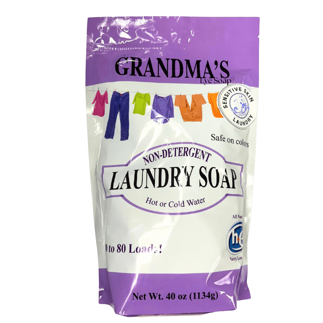 Purple and white resealable bag of Grandma's all-natural laundry soap featuring colorful clothes illustrations, labeled safe for sensitive skin and colors, suitable for use in hot or cold water, ideal for Home & Decor and Laundry Supplies collections.