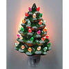 Handcrafted ceramic Christmas tree nightlight with multicolored bulbs and painted snow accents, providing a warm, festive glow for holiday decor and home collections.