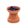 Handcrafted terracotta bee bath with bee illustrations, featuring blue glass stones for safe landing spots, designed for garden and animal care use in the USA.