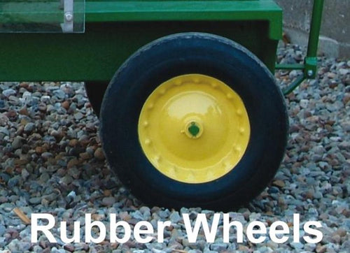 Close-up of a solid rubber wheel with yellow metal hub attached to a wooden ice cream trailer, part of Specialty Equipment, Kitchen & Food, Making Ice Cream, and Best Sellers collections.