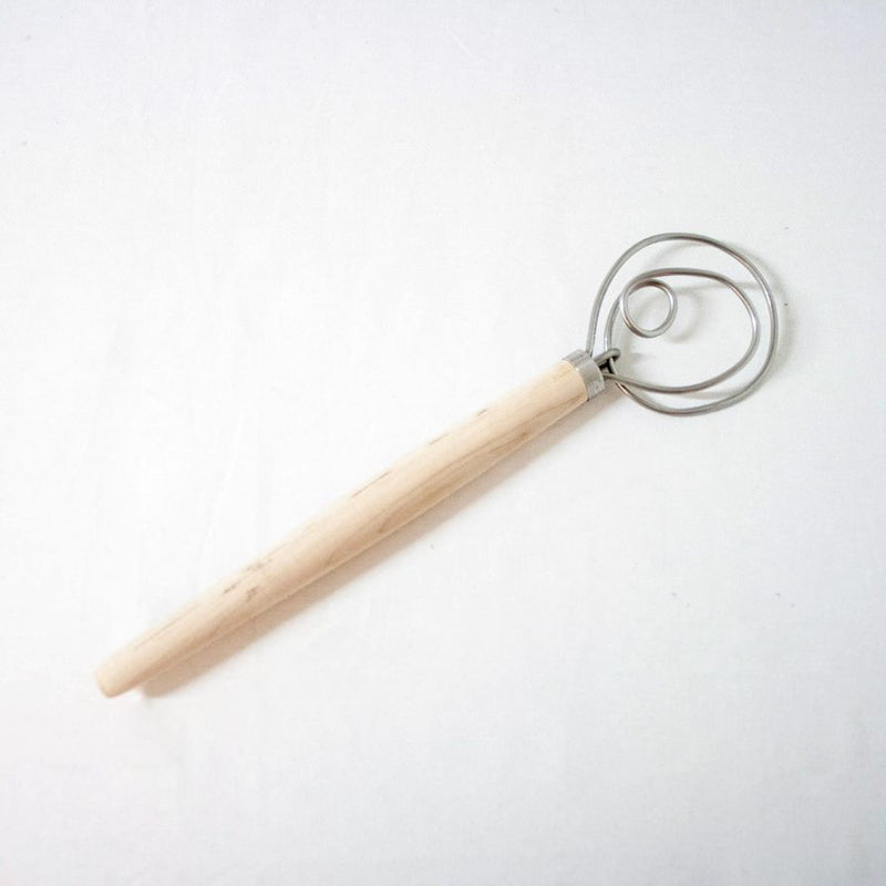 Handcrafted Old Country dough whisk with a smooth wooden handle and dual spiral metal wires, Amish made in USA, ideal for baking supplies, kitchen gadgets, and cookware collections.