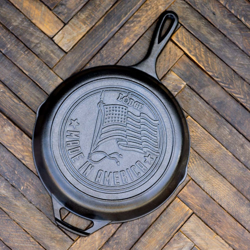 Handcrafted cast iron skillet with embossed American flag and "Made in America" text, featuring unmatched heat retention, perfect for Kitchen & Food, Cookware, Cast Iron, USA Made, Best Sellers, and Promo Eligible collections.