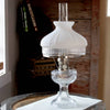 Handcrafted glass oil lamp with a white top shade and clear base, featuring classic design details, perfect for Lamps & Lighting, Parts and Accessories, and Lamp Shades collections.