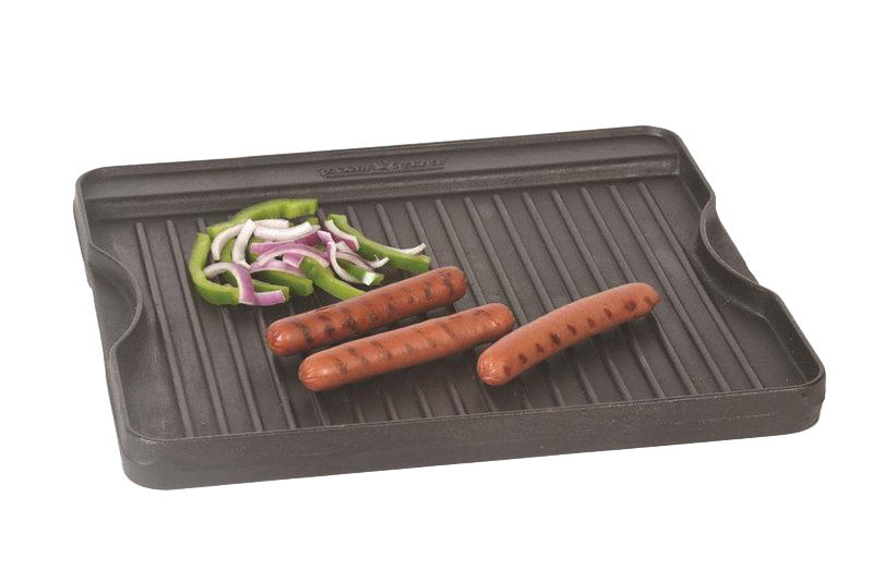 Small cast iron grill with ridged cooking surface holding grilled hot dogs and sliced green bell peppers and onions, ideal for Kitchen & Food and Cast Iron cookware collections.
