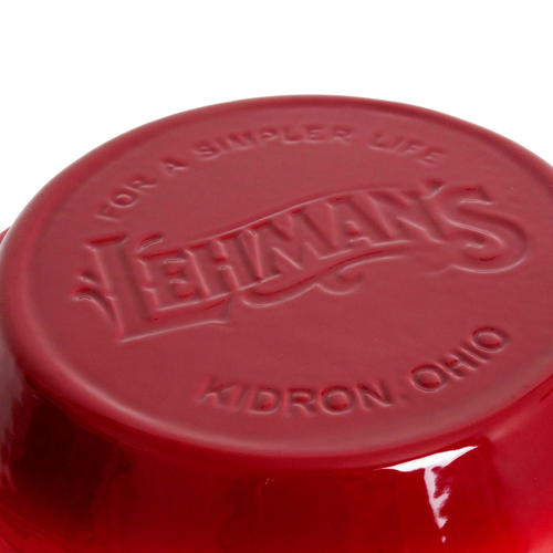 Close-up of the bottom of a handcrafted red cast iron pan embossed with Lehman’s logo and Kidron Ohio, highlighting durable Amish-made cookware for Kitchen & Food, Cast Iron, and Best Sellers collections.