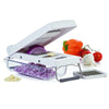 Handheld professional chopper with hinged white lid and removable clear bin, dicing purple onion and garlic, shown with fresh bell pepper, tomato, and garlic in Kitchen & Food and Food Prep collections.