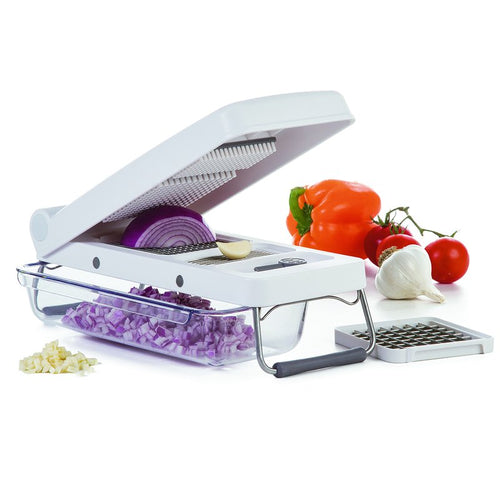 Handheld professional chopper with hinged white lid and removable clear bin, dicing purple onion and garlic, shown with fresh bell pepper, tomato, and garlic in Kitchen & Food and Food Prep collections.