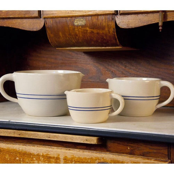 Set of three handcrafted stoneware batter bowls with classic blue stripe accents, sturdy and functional for Kitchen & Food, Cookware, Baking Supplies, USA Made, and Best Sellers collections.