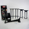 Components of a heavy-duty black plastic can crusher including a large lever, support brackets, mounting hardware, and product packaging, featured in Home & Decor, Household Helpers, USA Made, Best Sellers, and Promo Eligible collections.