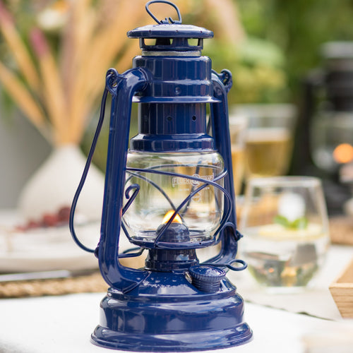 Handcrafted deep blue galvanized oil lantern with thermal heat-resistant SUPRAX globe, delivering durable lighting for camping, emergency supplies, and outdoor settings in lamps & lighting collections.