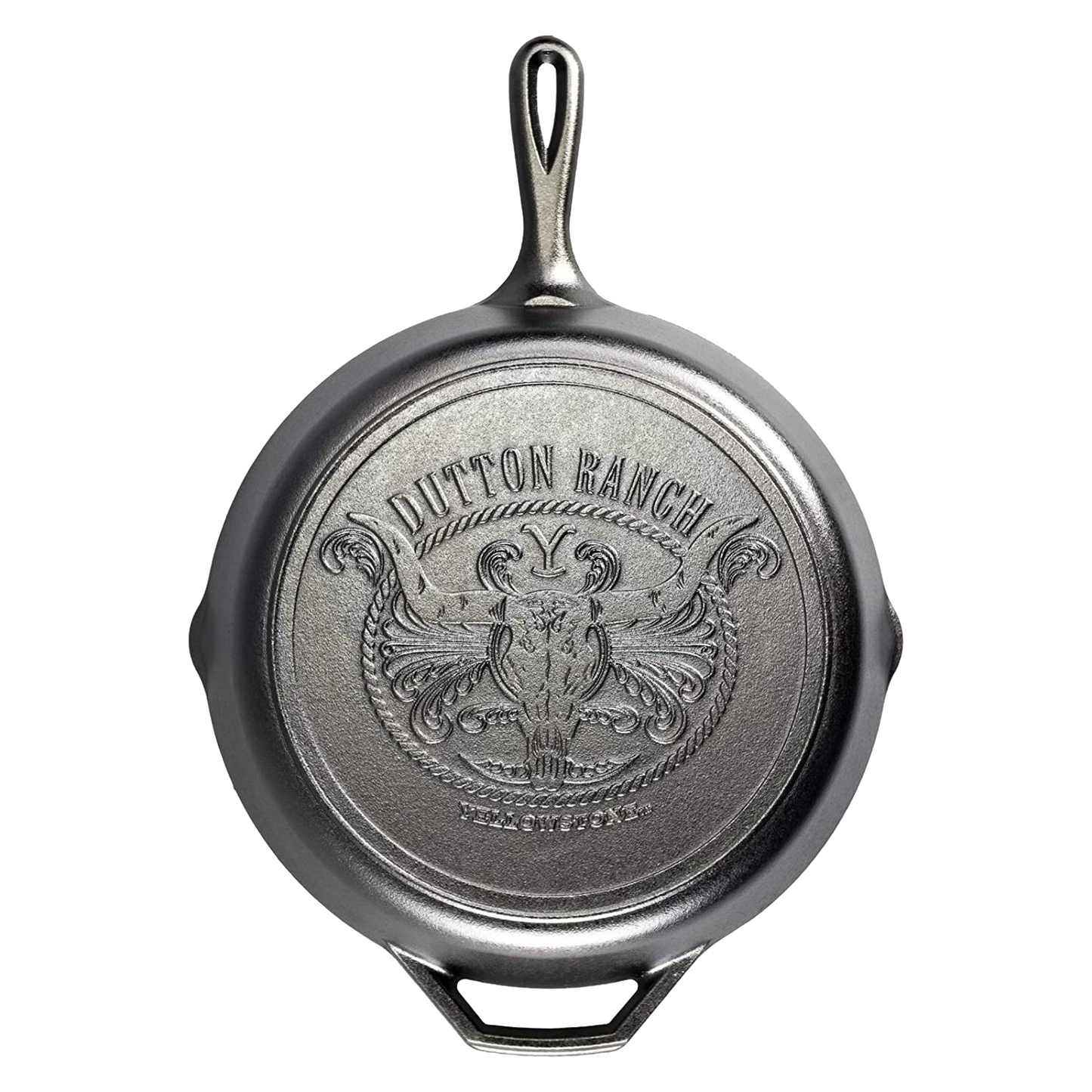 Bottom view of a handcrafted cast iron skillet featuring a detailed embossed design with a steer skull and rope motif, made in USA, ideal for Kitchen & Food and Cookware collections.