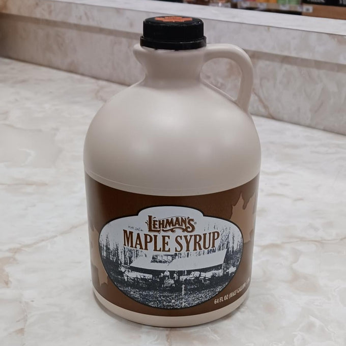 Handcrafted beige jug of amber maple syrup with classic brown label featuring vintage maple sugaring scene, ideal for Kitchen & Food, Pantry, USA Made, Best Sellers, and Promo Eligible collections.