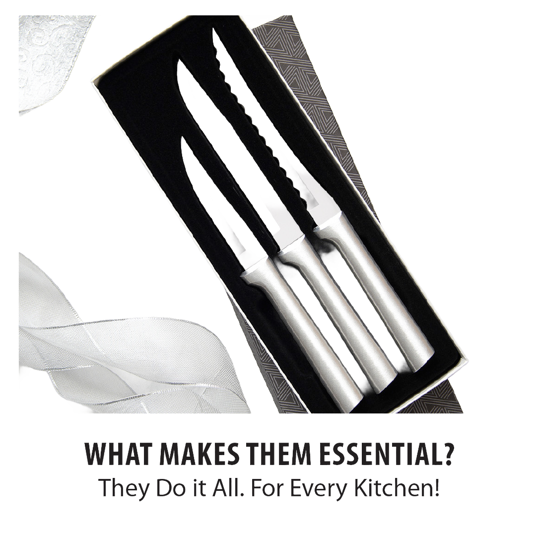 Three-piece set of handcrafted stainless steel knives with smooth silver handles, including a serrated tomato slicer, utility/steak knife, and heavy-duty paring knife in a black velvet gift box, made in USA.