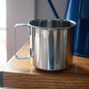 Lightweight stainless steel cup with seamless construction and a convenient handle, ideal for camping or everyday use, featured in Kitchen & Food and Best Sellers collections.