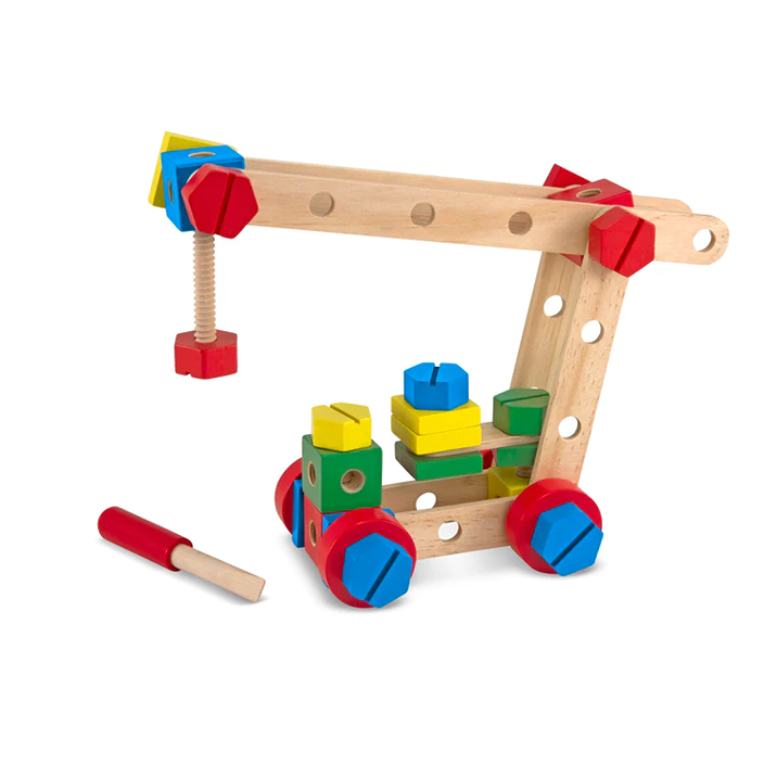 Wooden construction toy featuring colorful nuts, bolts, and blocks assembled into a crane on wheels with a child-size screwdriver, promoting fine motor skills and problem-solving in indoor play.