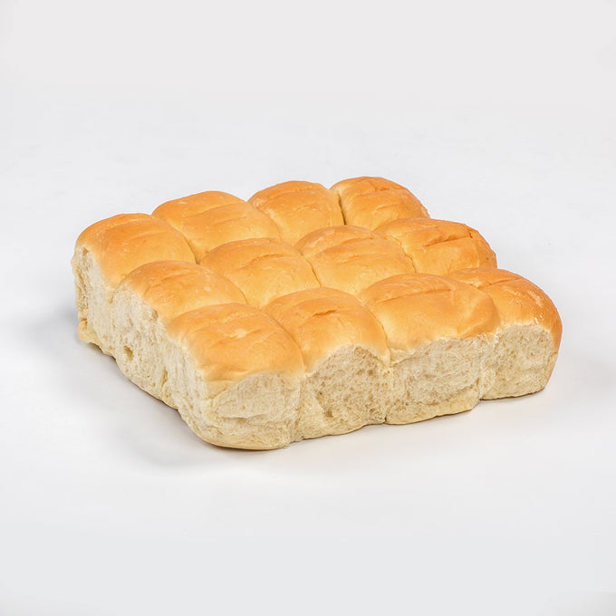 Twelve handcrafted, soft dinner rolls with a golden crust, made in the USA, ideal for Kitchen & Food, Snacks and Sweets, Best Sellers, and Promo Eligible collections.