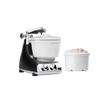 Black and silver ice cream mixer attachment with white freezing bowl and additional bowl filled with ice cream, designed as a specialty kitchen gadget for making frozen treats with ease.