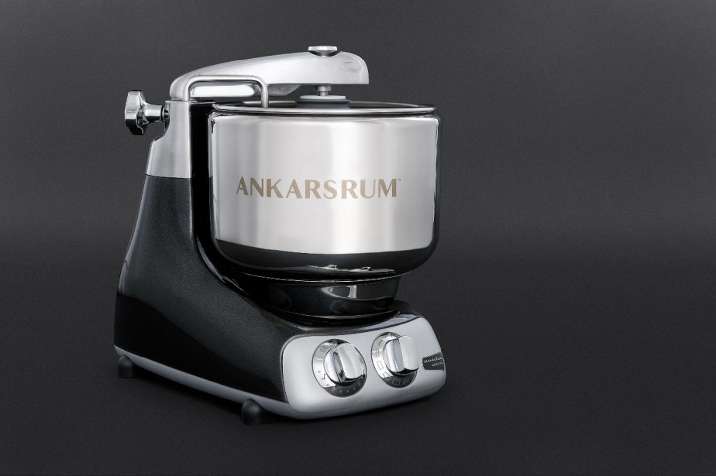 Black and silver stand mixer with polished stainless steel bowl and dual control dials, designed for heavy-duty baking tasks; featured in Kitchen & Food, Baking Supplies, and Cooking and Baking Helpers collections.