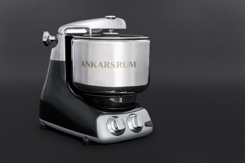 Black and silver stand mixer with polished stainless steel bowl and dual control dials, designed for heavy-duty baking tasks; featured in Kitchen & Food, Baking Supplies, and Cooking and Baking Helpers collections.