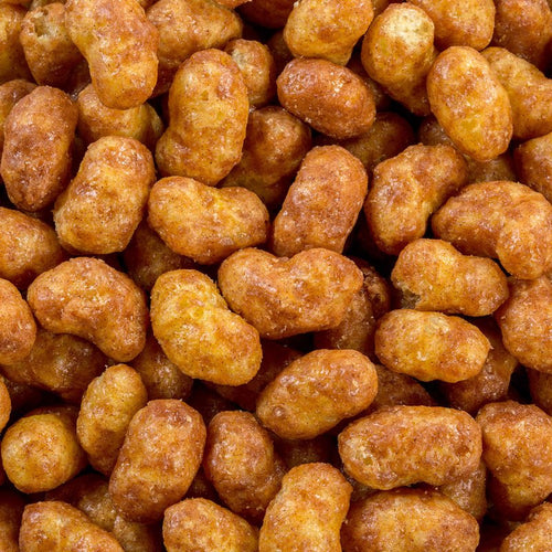 Close-up of crunchy cinnamon-covered corn puffs with a sweet coating, handcrafted and made in USA, featured in Kitchen & Food, Snacks and Sweets, USA Made, Best Sellers, and Promo Eligible collections.