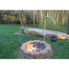 Outdoor fire pit with sturdy 36" support post and kettle hook holding a black cast iron pot over flames, showcasing durable, weather-resistant stainless steel grilling gear for Farm, Garden & Tool and Camping collections.