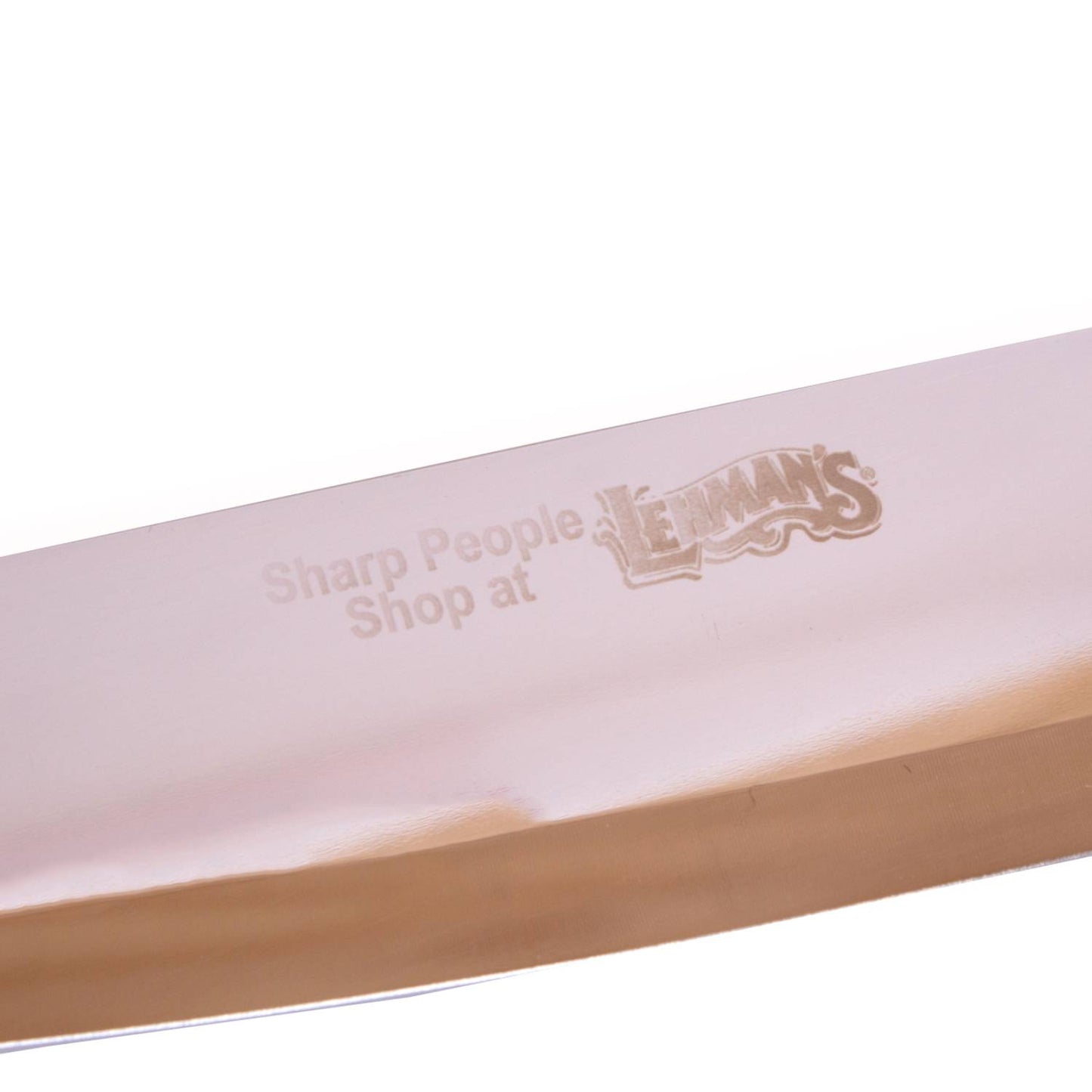 Close-up of a polished stainless steel blade etched with the Lehman’s logo, reflecting light to highlight its sharp, smooth edge from a handcrafted kitchen utility knife.