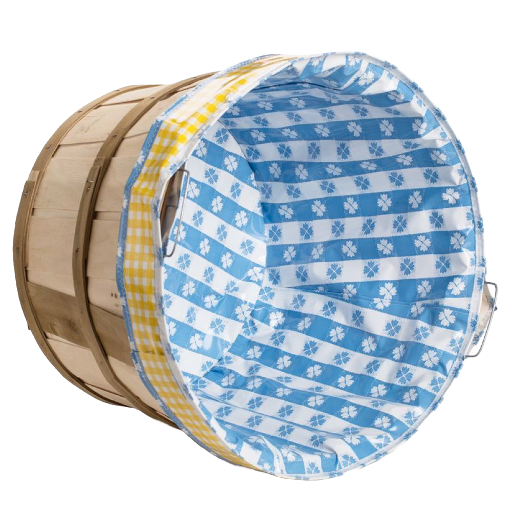 Reusable fabric liner featuring blue and white floral and stripe pattern with yellow gingham trim, designed to protect bushel baskets and simplify laundry, part of Home & Decor and Laundry Supplies collections.