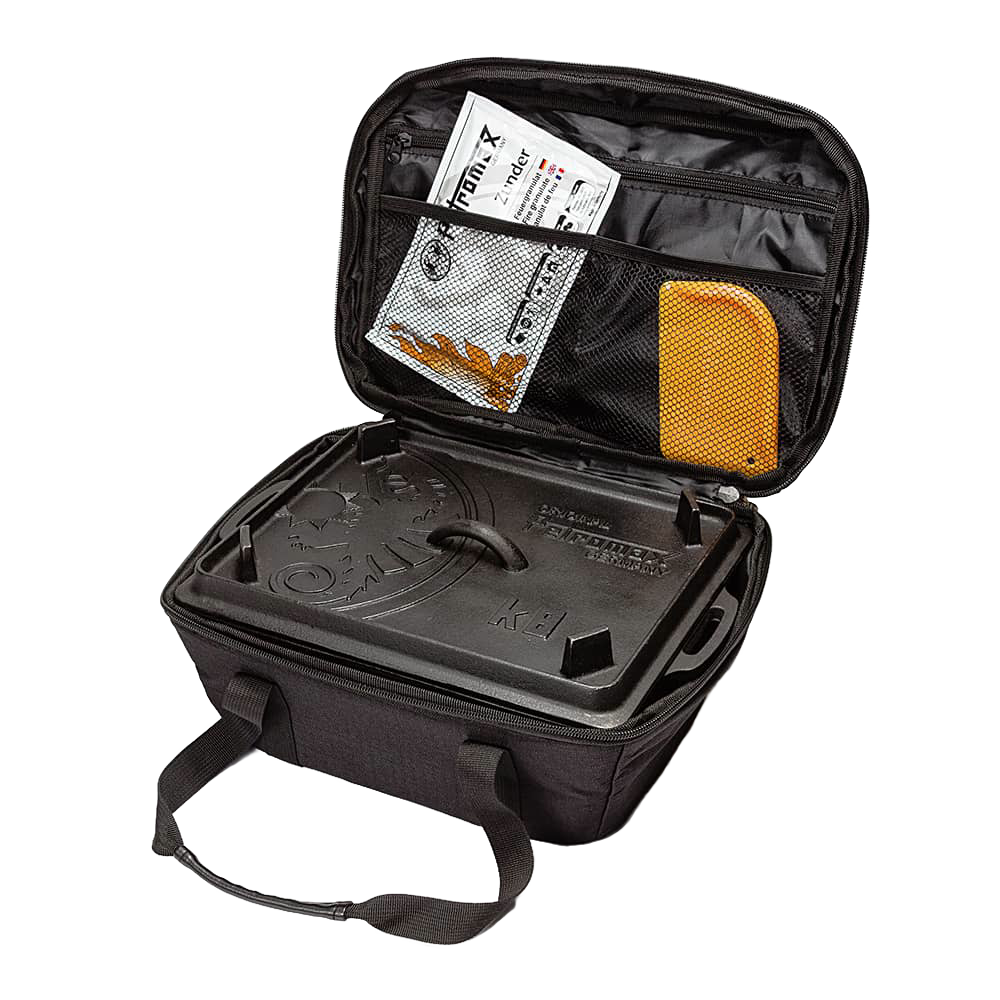Black transport bag with handles and zippered mesh pocket, designed to safely hold a cast iron loaf pan and accessories, perfect for camping, farm, garden, and bread making supplies.