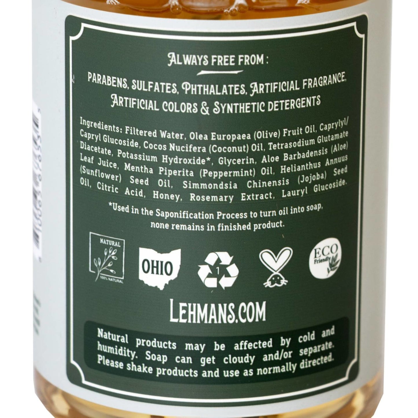 Close-up of the back label on a handcrafted soap bottle highlighting natural ingredients like olive, coconut, sunflower, jojoba oils, honey, and peppermint, free from synthetic additives, made in USA, ideal for Health & Wellness, Grooming and Personal Hygiene, and Soaps collections.