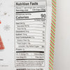 Nutrition facts label showing 90 calories per serving with zero fat, cholesterol, vitamins, and minerals, plus 14g added sugars, on packaging with festive red, white, and green striped edge, part of Kitchen & Food and USA Made collections.
