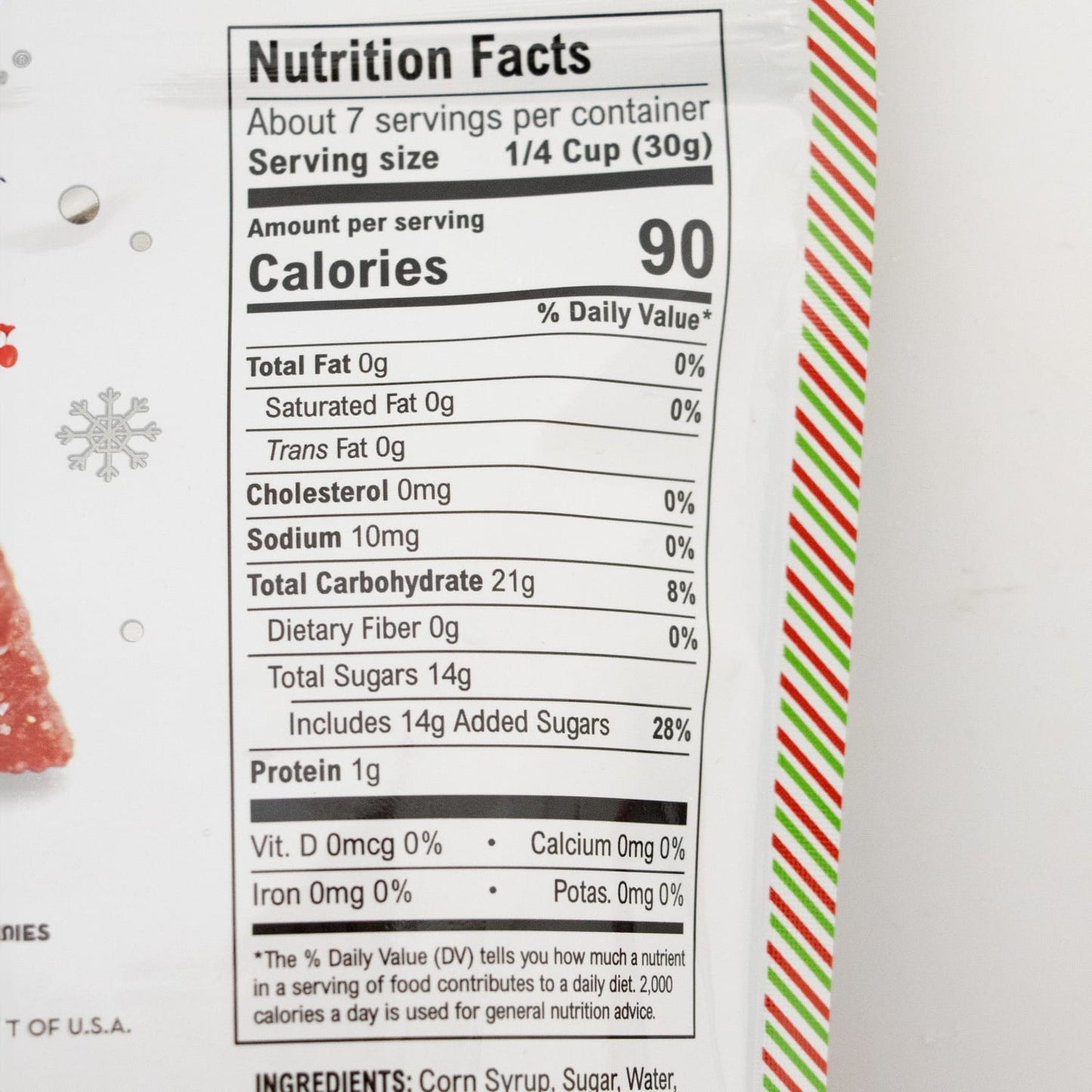 Nutrition facts label showing 90 calories per serving with zero fat, cholesterol, vitamins, and minerals, plus 14g added sugars, on packaging with festive red, white, and green striped edge, part of Kitchen & Food and USA Made collections.