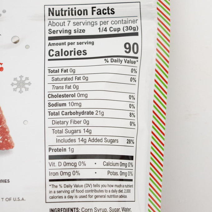 Nutrition facts label showing 90 calories per serving with zero fat, cholesterol, vitamins, and minerals, plus 14g added sugars, on packaging with festive red, white, and green striped edge, part of Kitchen & Food and USA Made collections.